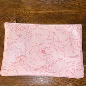 Pink rose Ipsy bag with rose gold pull tag